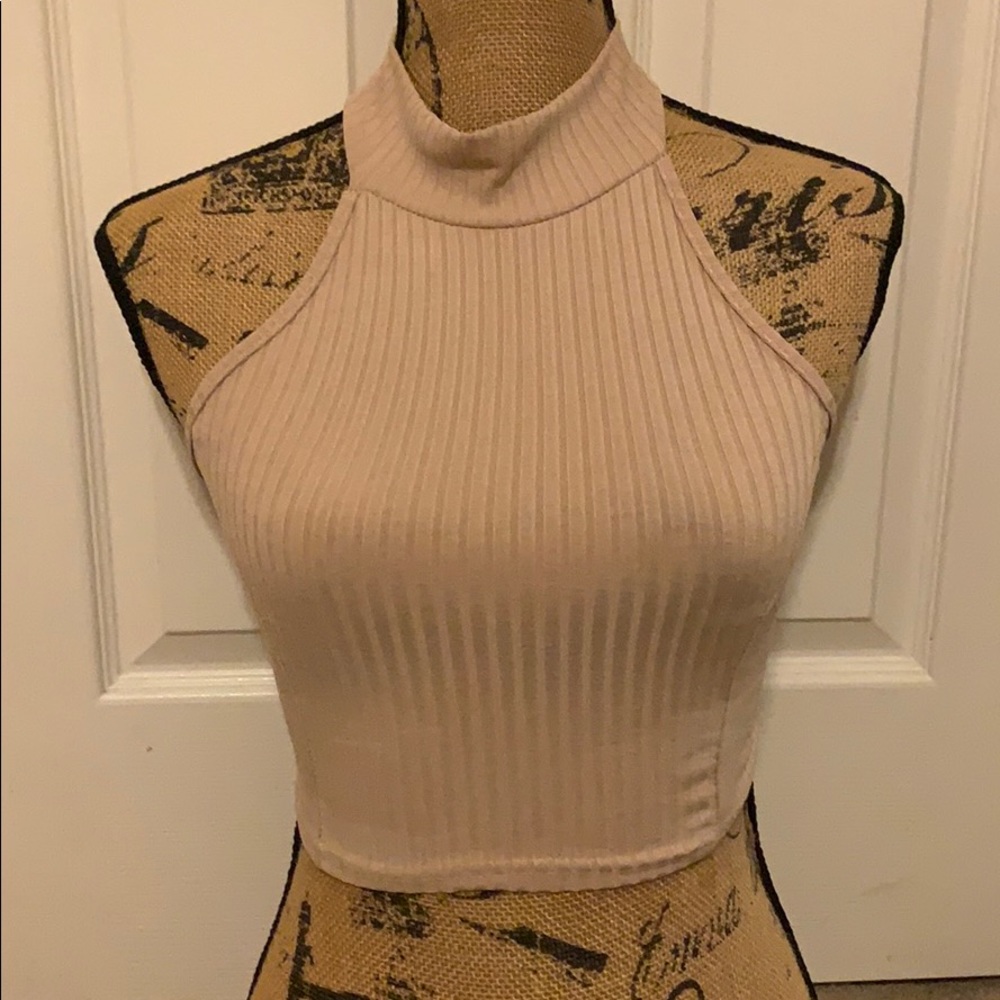Tan cropped halter top.